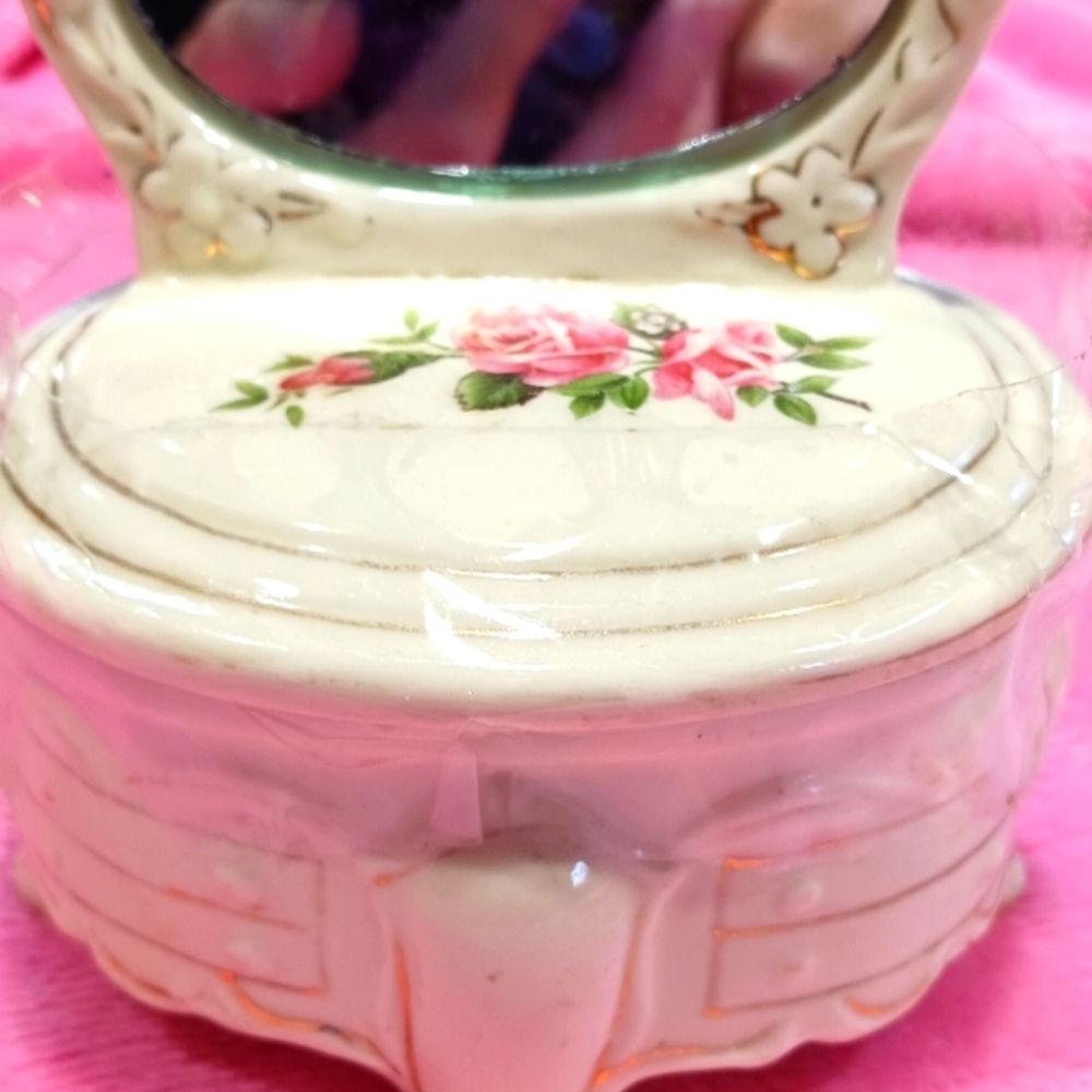 Lovely vintage lipstick or jewelry box.